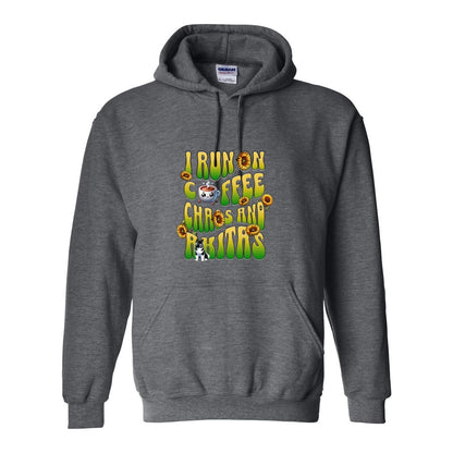 Grey hooded sweatshirt with text 'I RUN ON COFFEE CHAOS AND Akitas' featuring colorful graphics.
