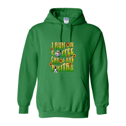 Green hooded sweatshirt with text 'I RUN ON COFFEE CHAOS AND Akitas' featuring colorful graphics.