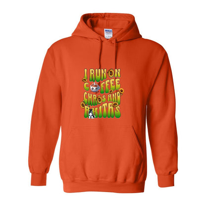 Orange hooded sweatshirt with text 'I RUN ON COFFEE CHAOS AND Akitas' featuring colorful graphics.