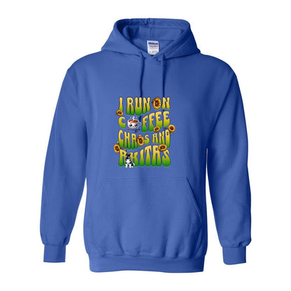 Blue hooded sweatshirt with text 'I RUN ON COFFEE CHAOS AND Akitas' featuring colorful graphics.